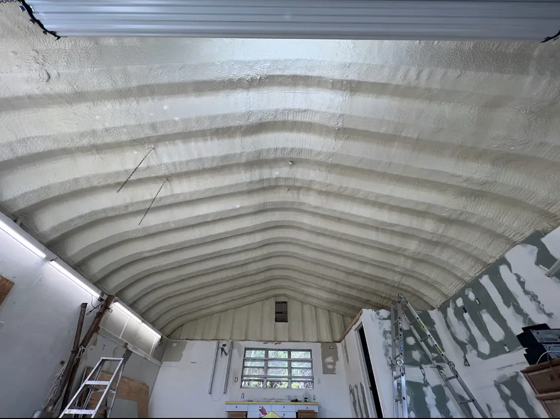 Spray polyurethane foam applied to the underside of a metal roof deck in Cypress Lake